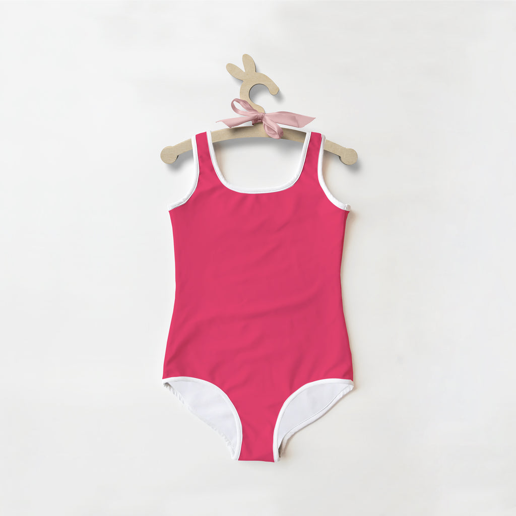 Girls buttery soft rose color one-piece swimsuit with white trim and UPF 50 plus sun protection