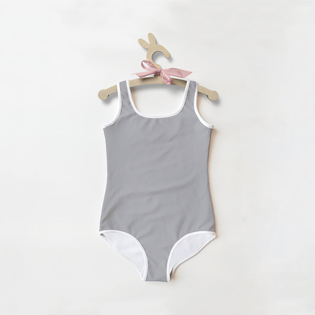 Gray girls one-piece swimsuit with white trim made of soft stretchy fabric and upf 50 plus sun protection