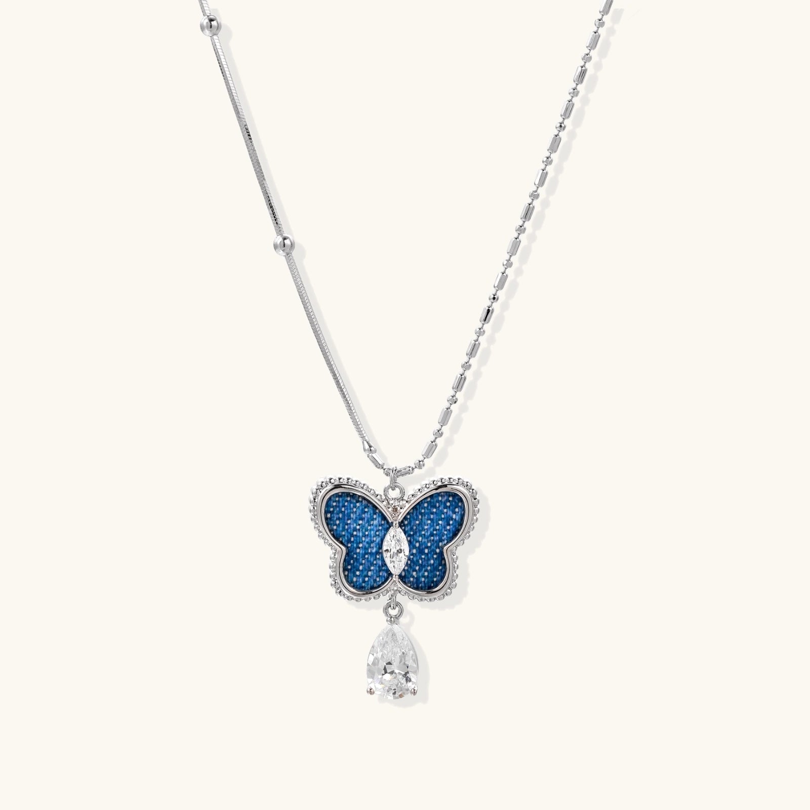 Denim Butterfly Necklace - Pear Cut Zirconia Drop,  White Gold Plated Eco-Brass & Asymmetrical Chain
