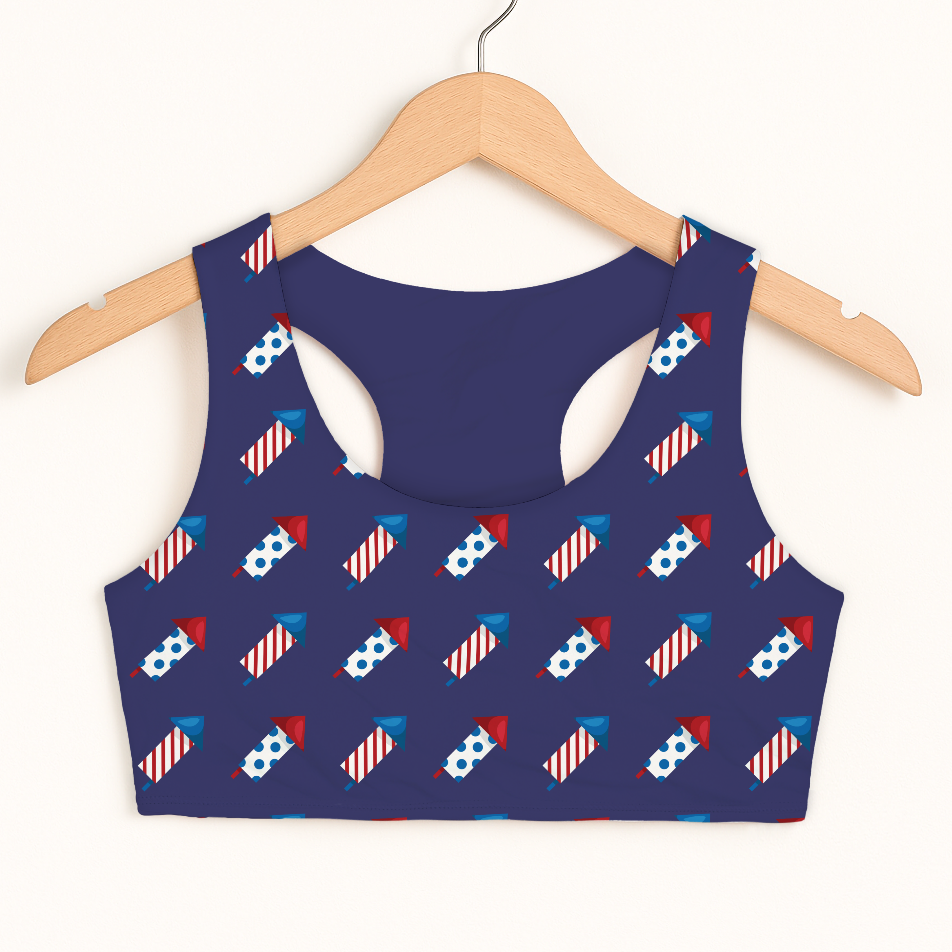 Girls 4th of July fireworks sports bra in navy blue with red white and blue fireworks print quick drying double layered comfort