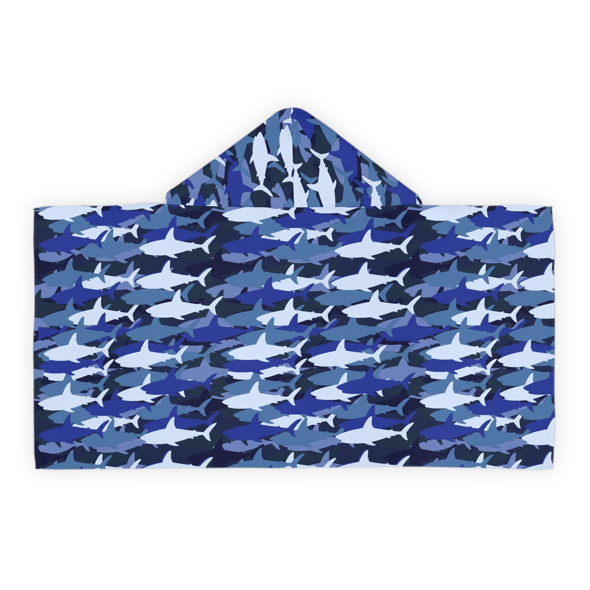 Kids blue shark hooded towel with soft absorbent fabric featuring blue and white shark patterns for bath and beach use