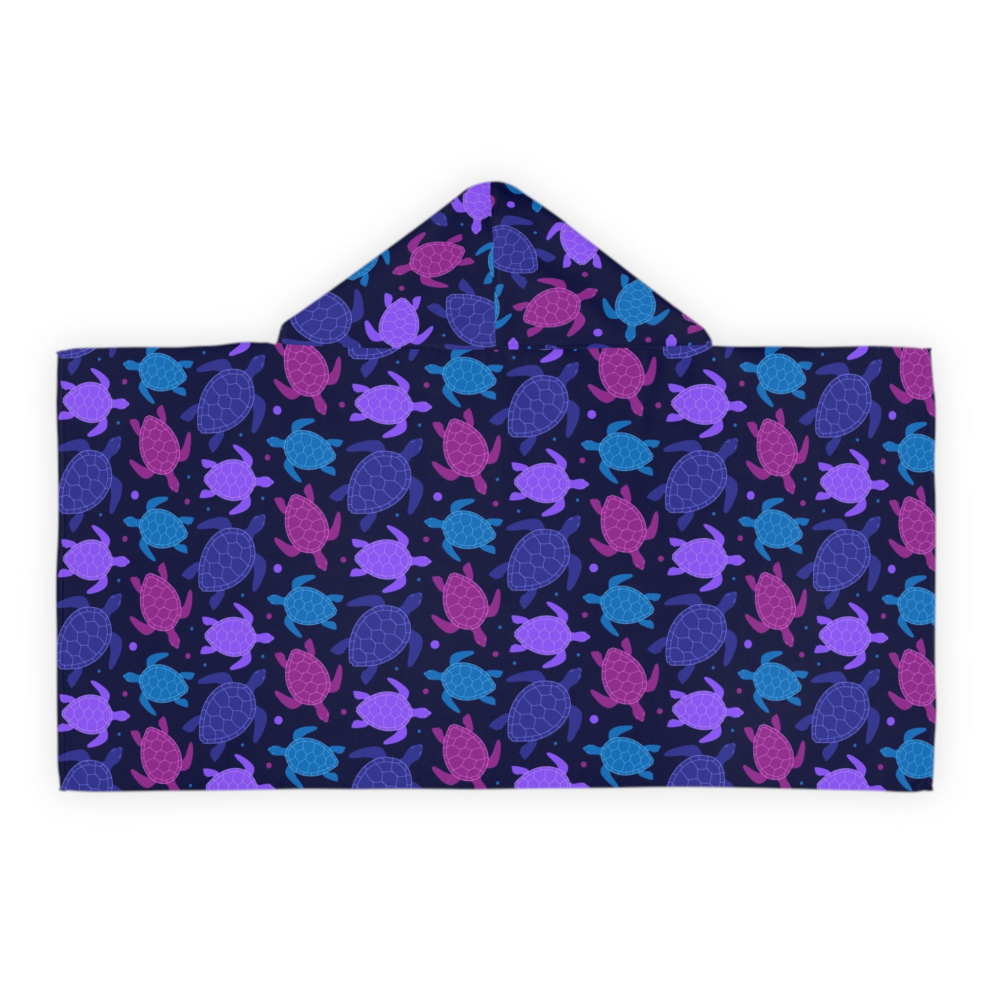A navy blue kids hooded towel with a soft absorbent fabric and vibrant purple pink and teal sea turtle pattern