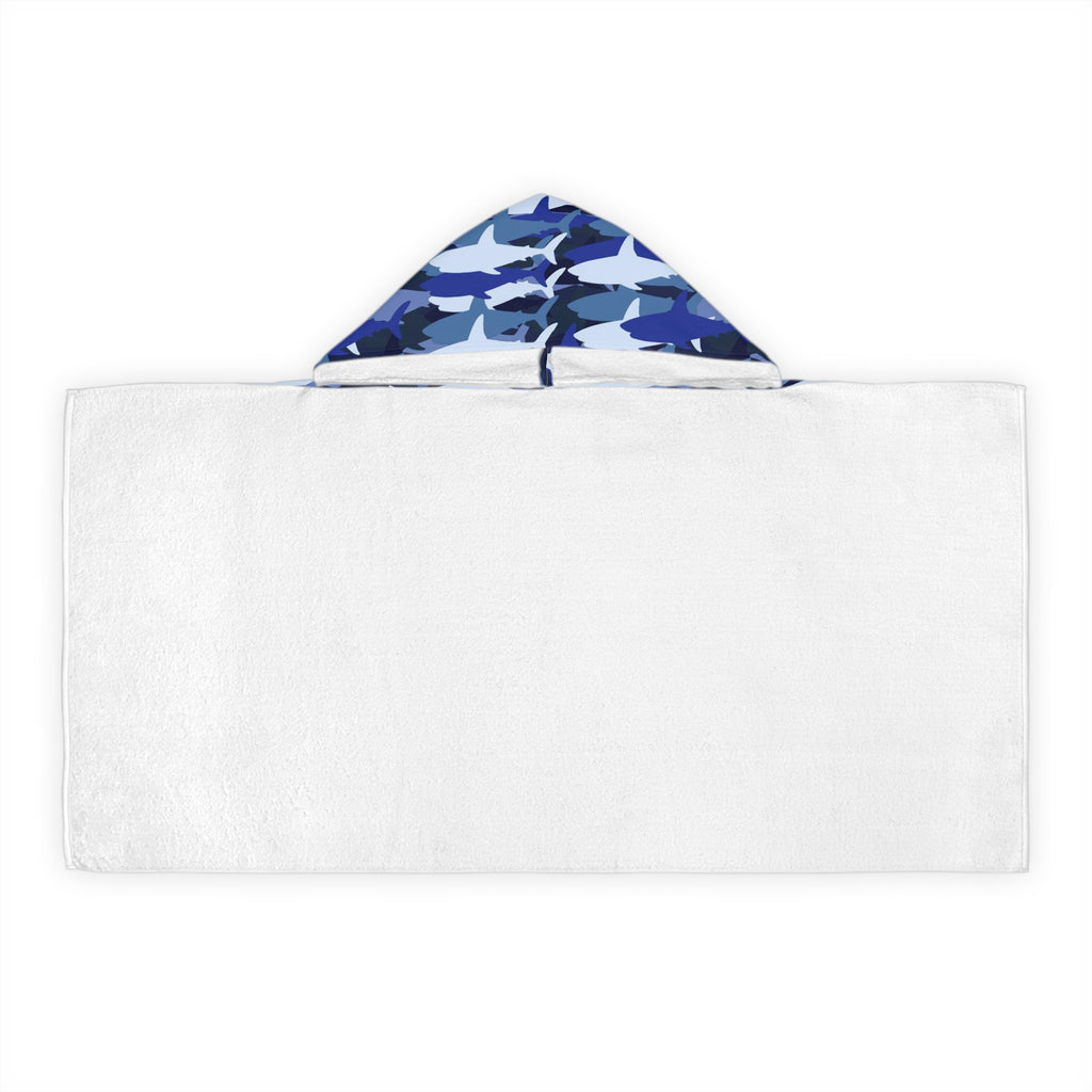 White hooded towel with a soft absorbent fabric and blue and white shark camouflage pattern on the hood for kids