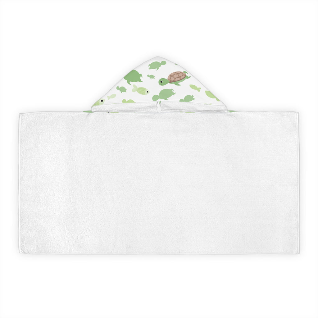 White hooded towel with playful green sea turtles and fish pattern on hood soft absorbent for kids bath and beach wrap