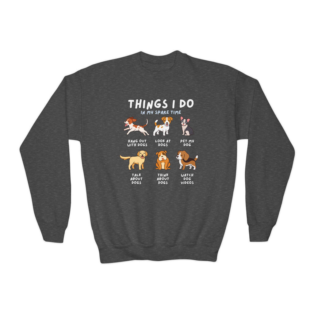 A child wearing a dark gray sweatshirt with text and illustrations of dogs, indicating favorite activities 'Things I Do In My Spare Time'.