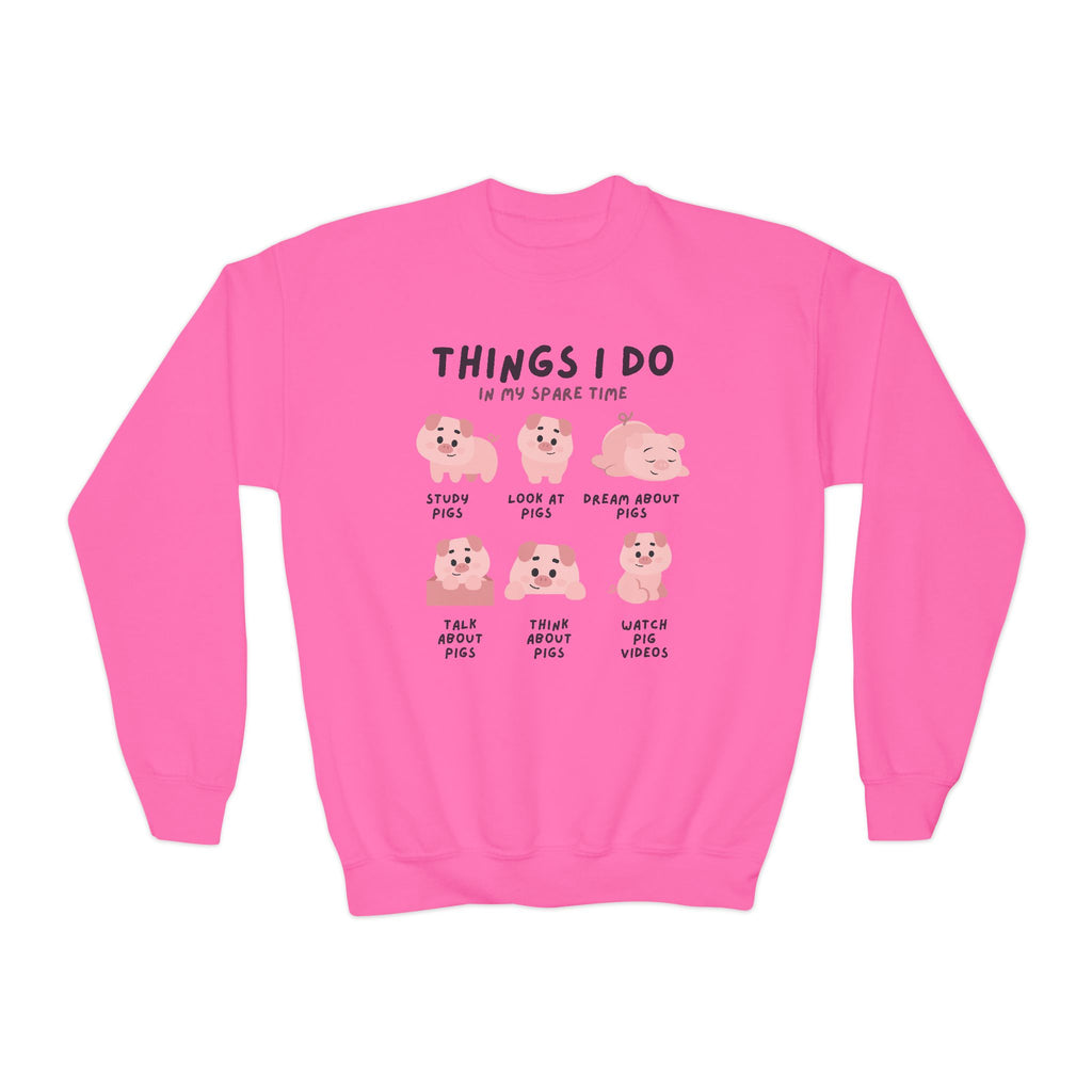 Kids pink long-sleeved sweatshirt with playful cartoon pigs and text things i do in my spare time cozy and fun