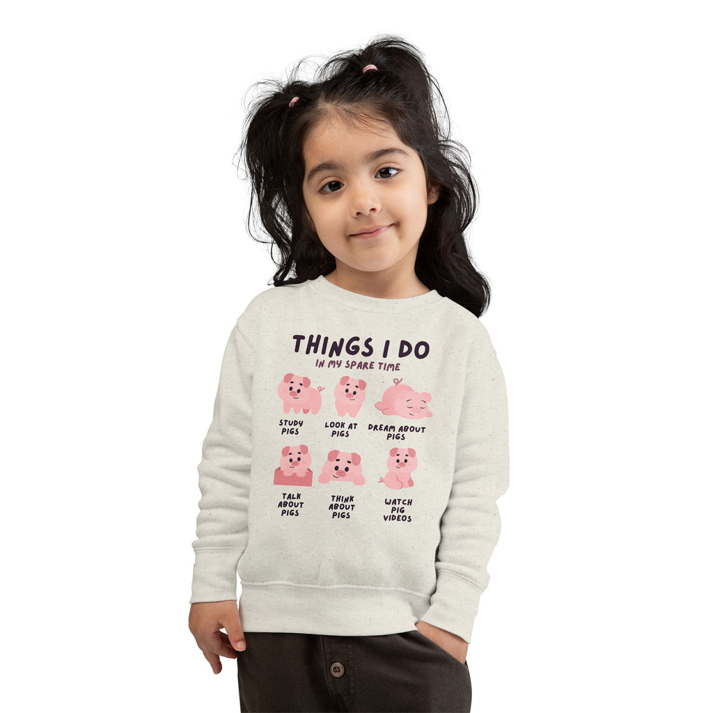 Off-white kids long-sleeved sweatshirt with pink pig illustrations and black text things i do in my spare time