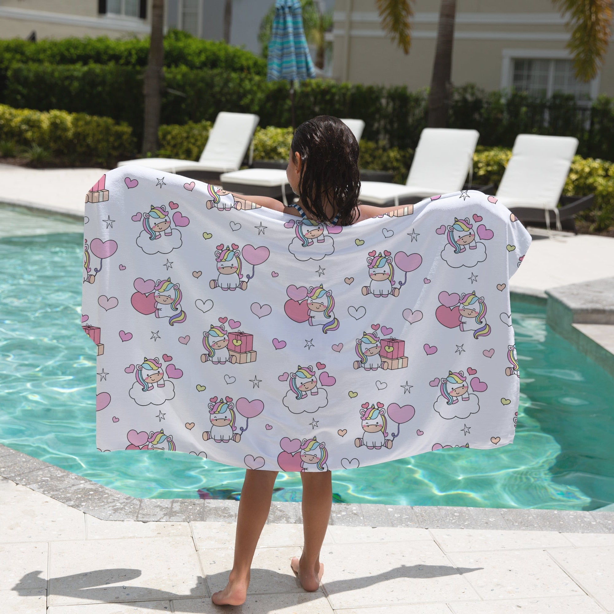 White girls unicorn birthday towel featuring colorful cartoon unicorns hearts and stars printed on soft fabric