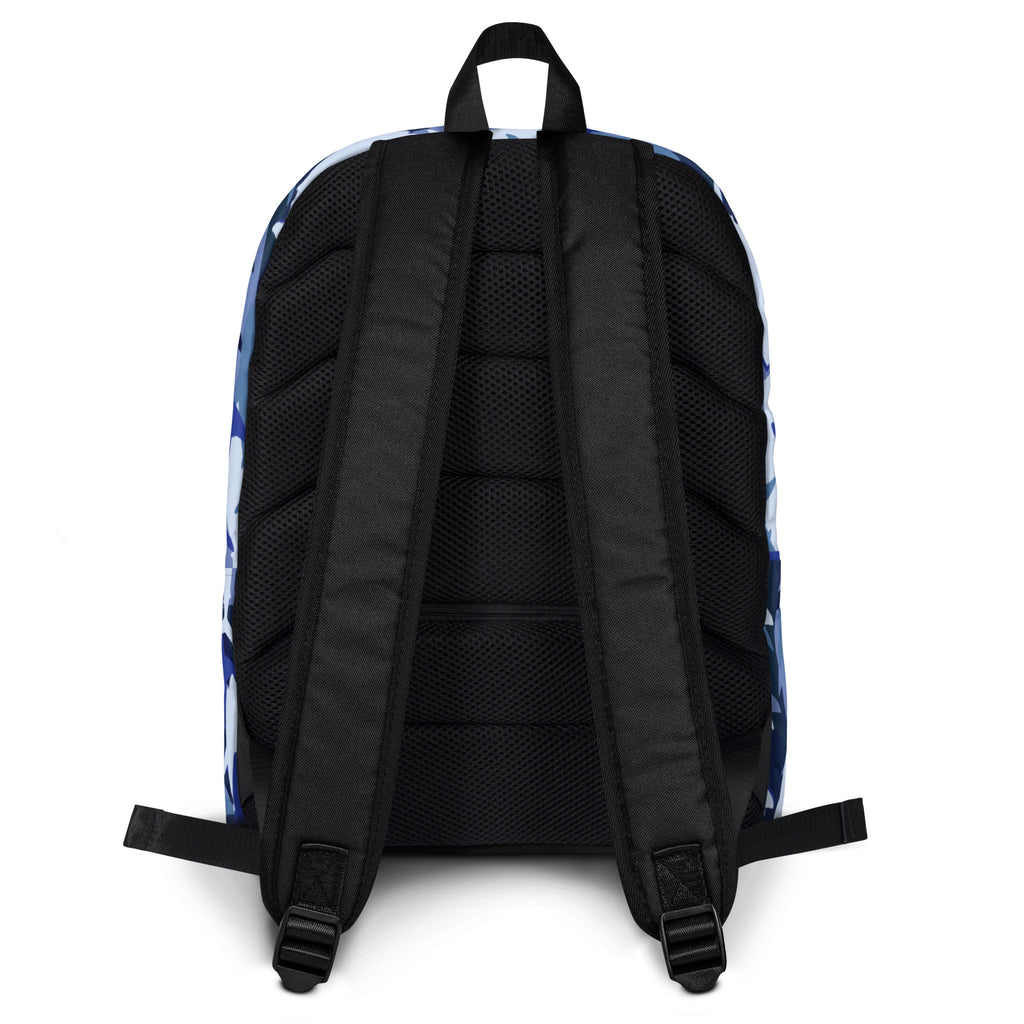 Kids blue sharks backpack with blue and white camouflage pattern and black mesh back panel shown from the back side