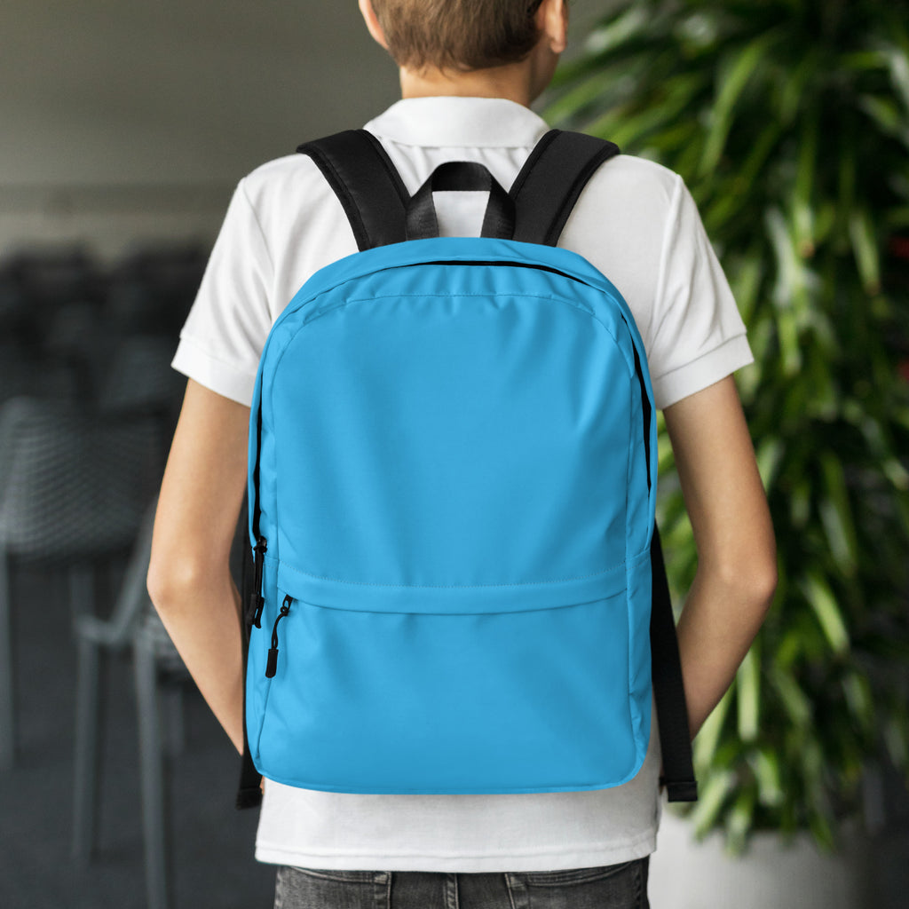 Kids sky blue backpack made of bright blue nylon with black straps and zipper pulls for everyday use