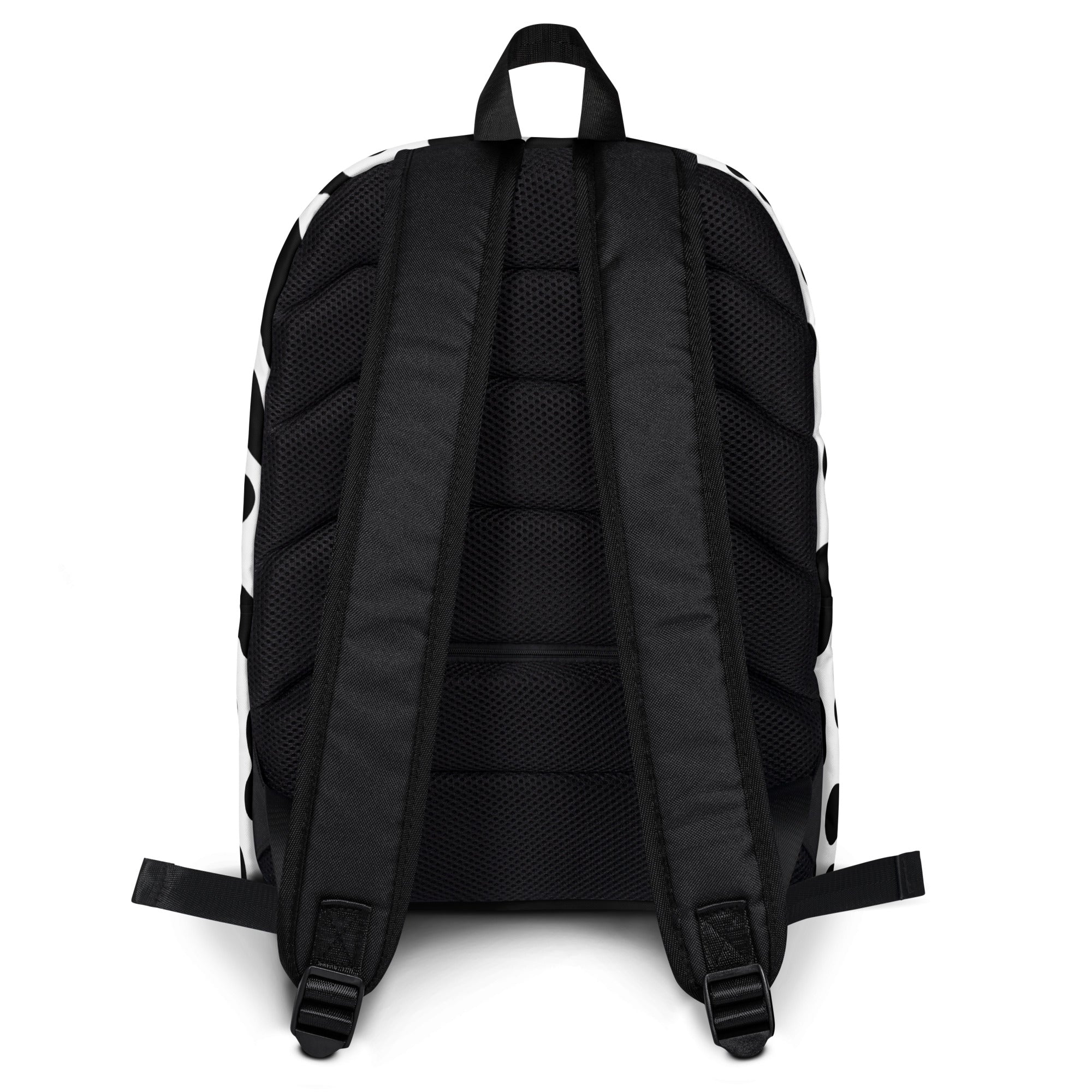 Kids cow print backpack in black and white polka dots showing mesh back panel and adjustable shoulder straps