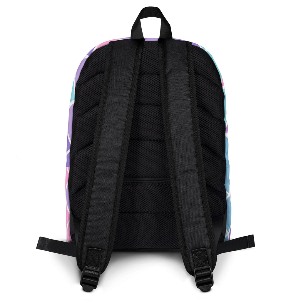 Girls mermaid scale backpack showing back with pastel rainbow geometric pattern and black mesh straps and panel