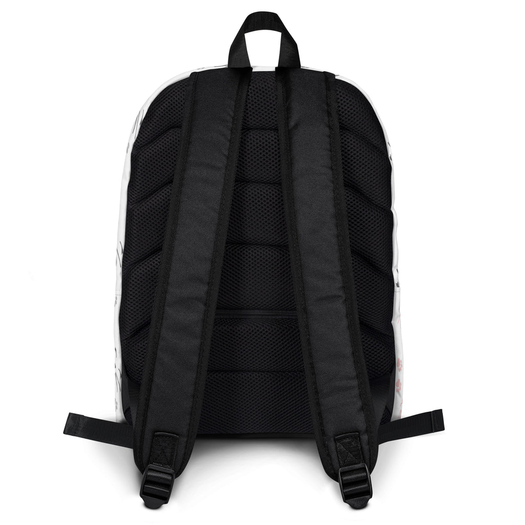 Black mesh-backed girls paw print cat backpack with white exterior and black straps shown from the back side