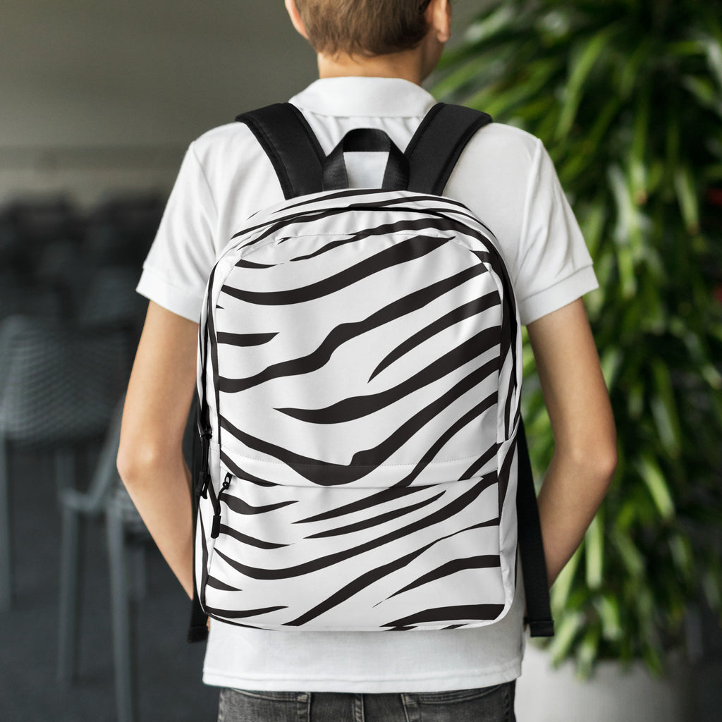 Kids zebra print backpack with black and white stripes and black straps for school or casual use