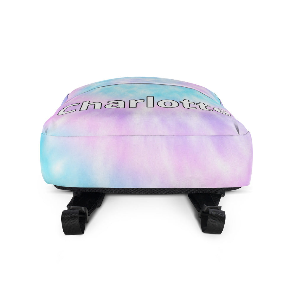 Pastel tie dye faux backpack for girls with custom name charlotte printed on the back in black lettering