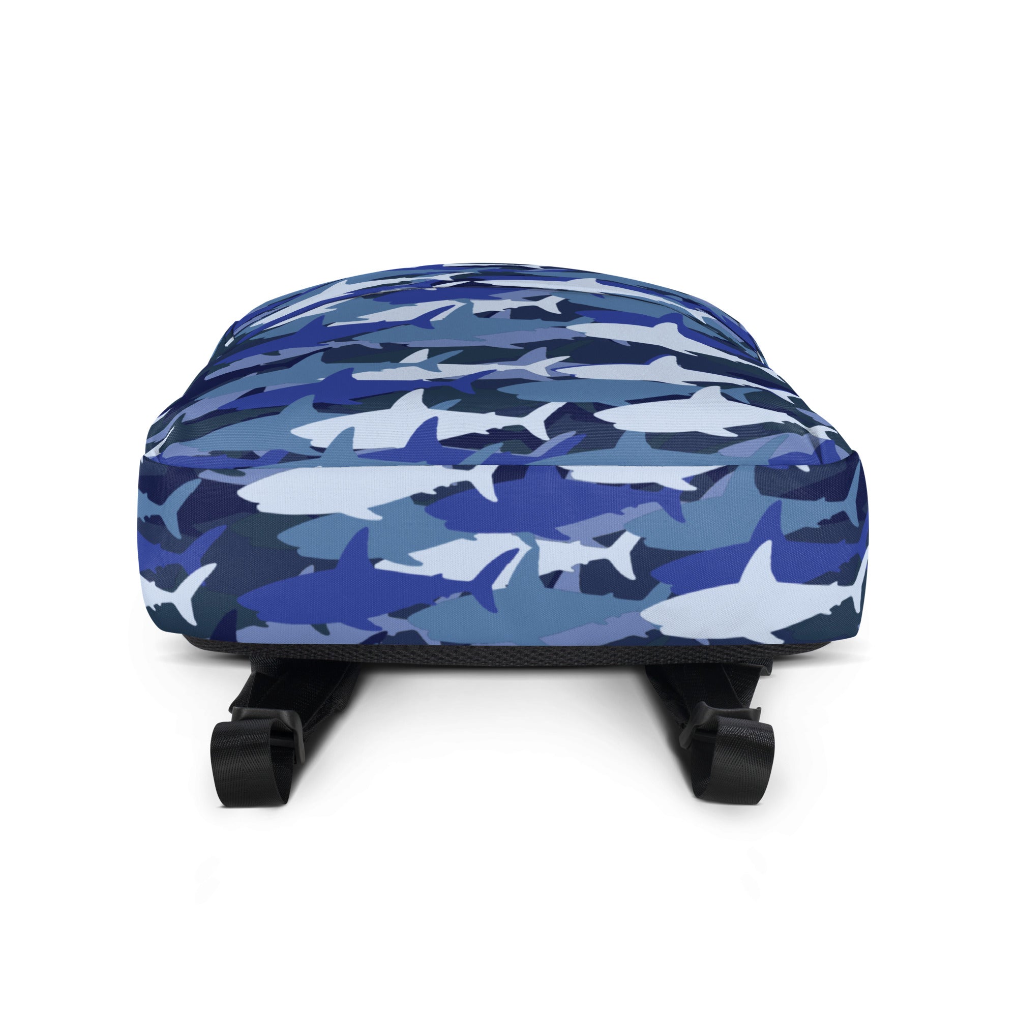 Kids blue sharks backpack with blue white shark camouflage pattern and black straps shown from the back side