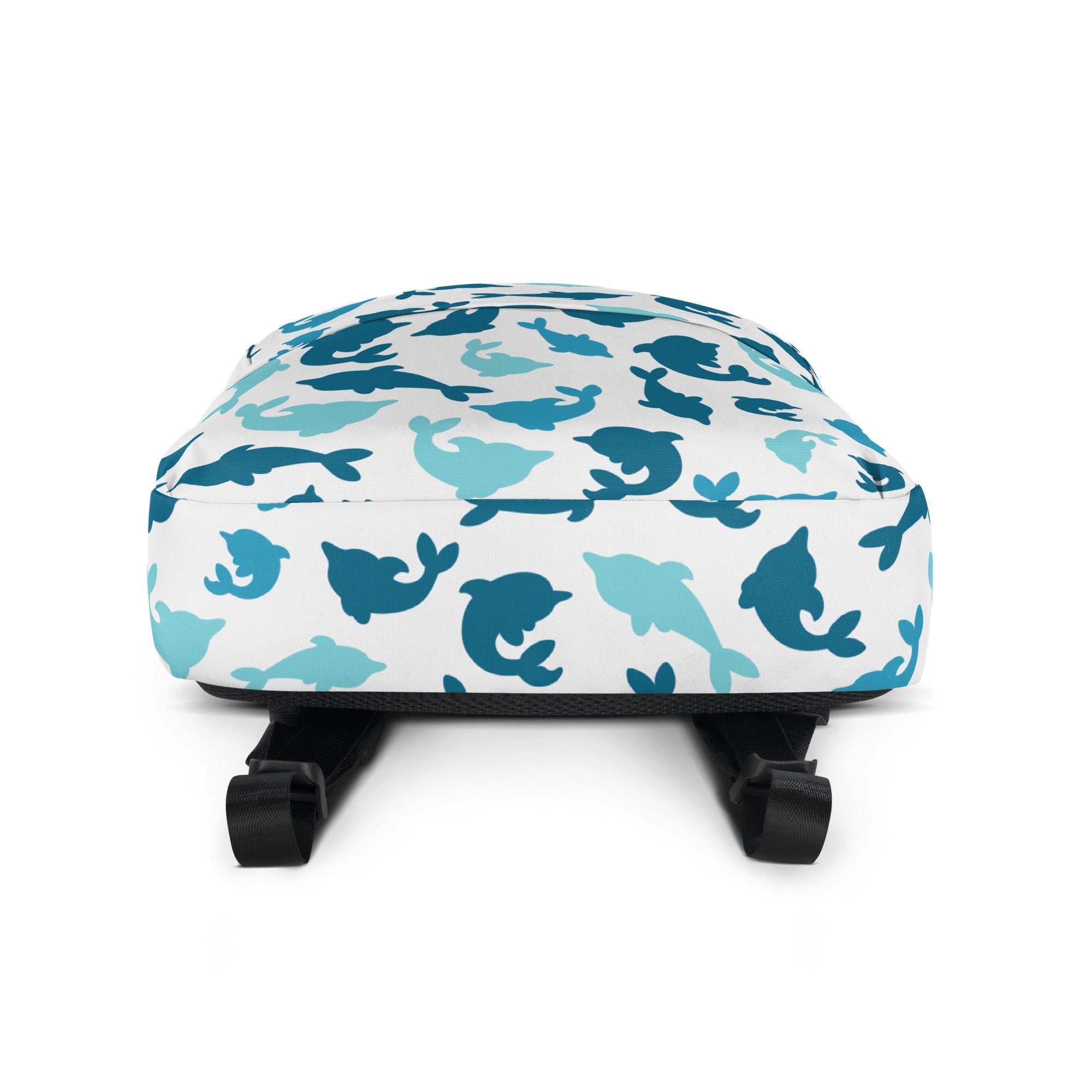 White kids backpack with playful blue and teal dolphin silhouette pattern perfect for school or outings