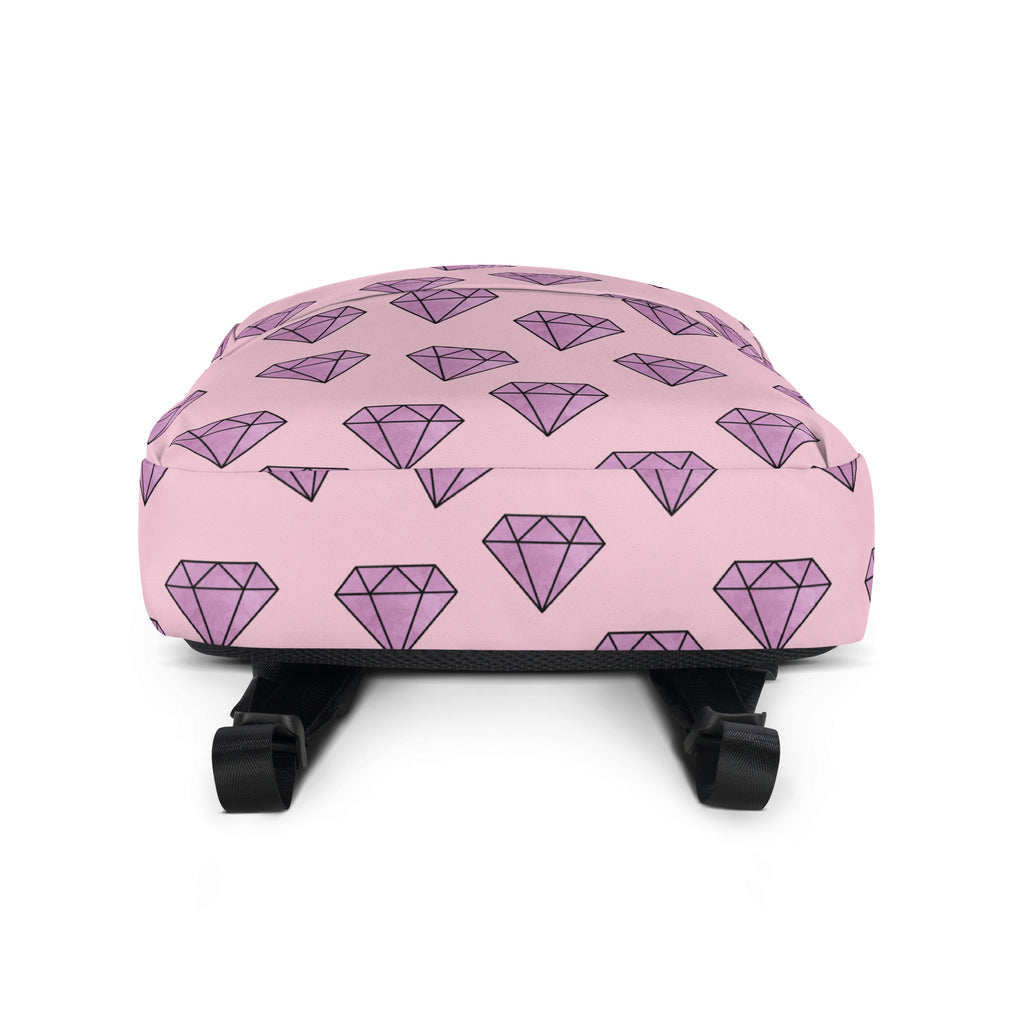 Girls purple diamonds backpack pink with repeating pattern of purple diamond shapes outlined in black
