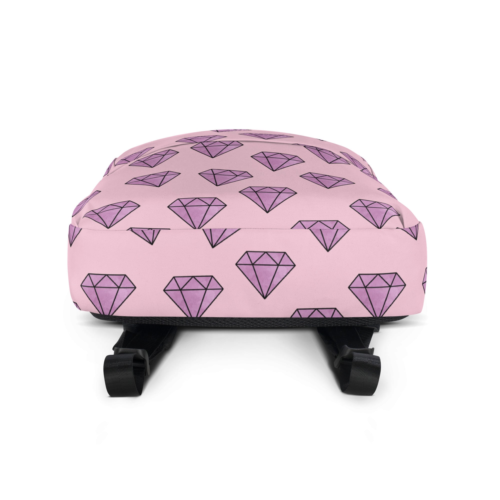 Girls purple diamonds backpack pink with repeating pattern of purple diamond shapes outlined in black