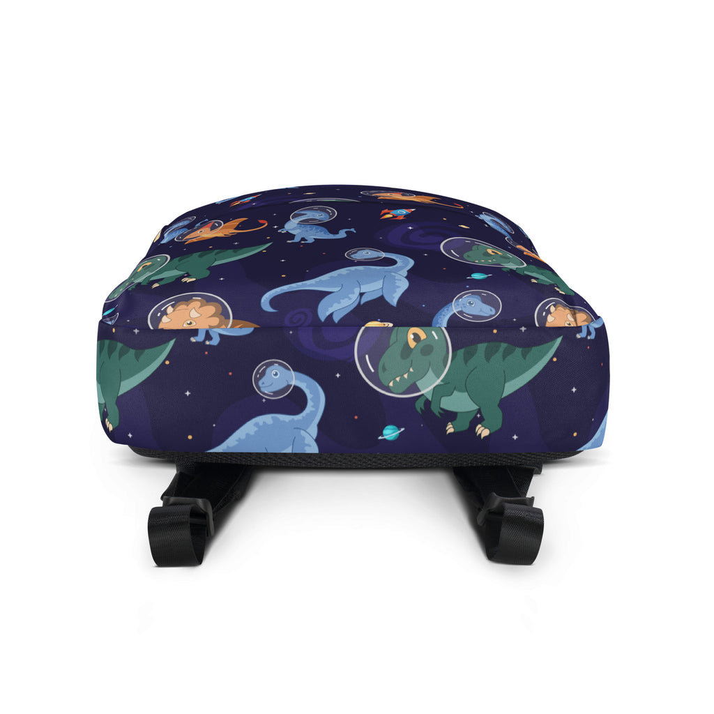 Kids space dinosaurs backpack navy blue with cartoon dinosaurs in astronaut helmets floating among stars and planets