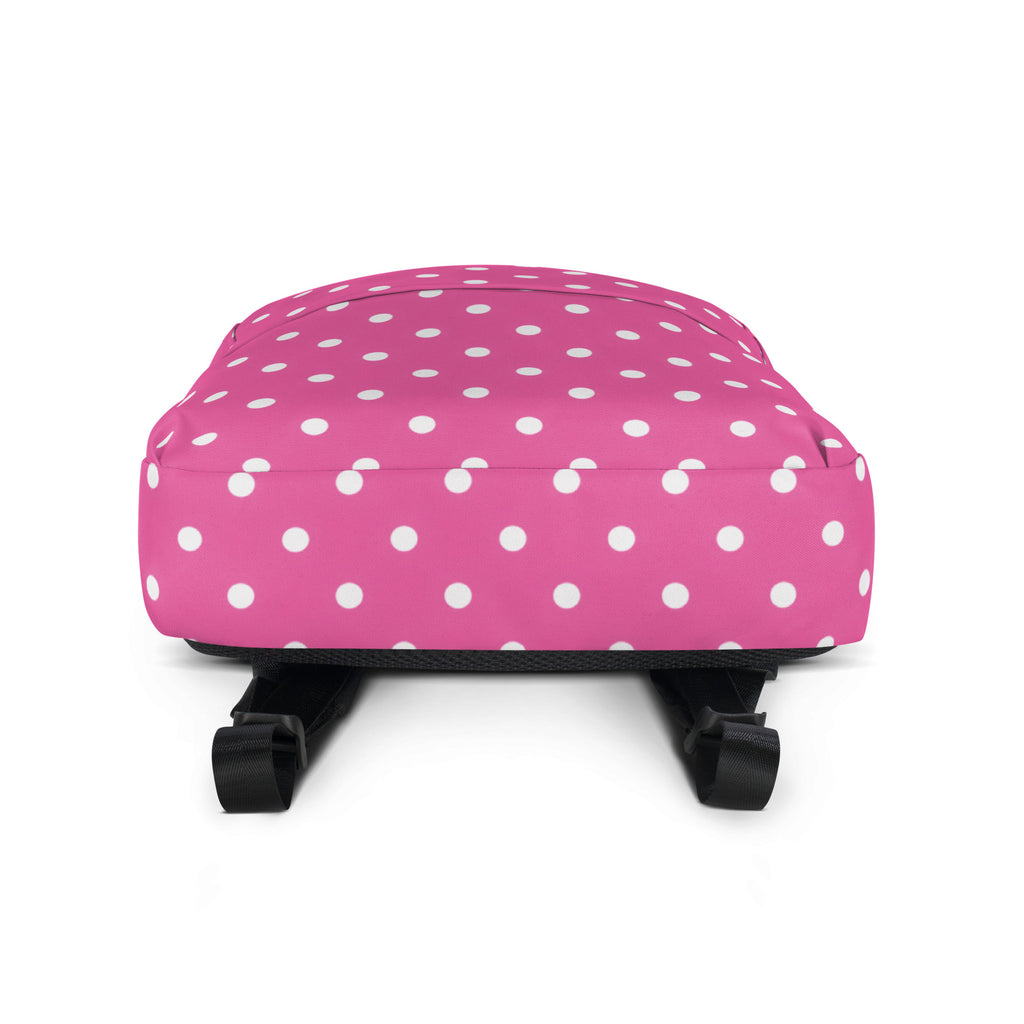 Girls pink polka dots backpack with white spots and black straps perfect for school and everyday use