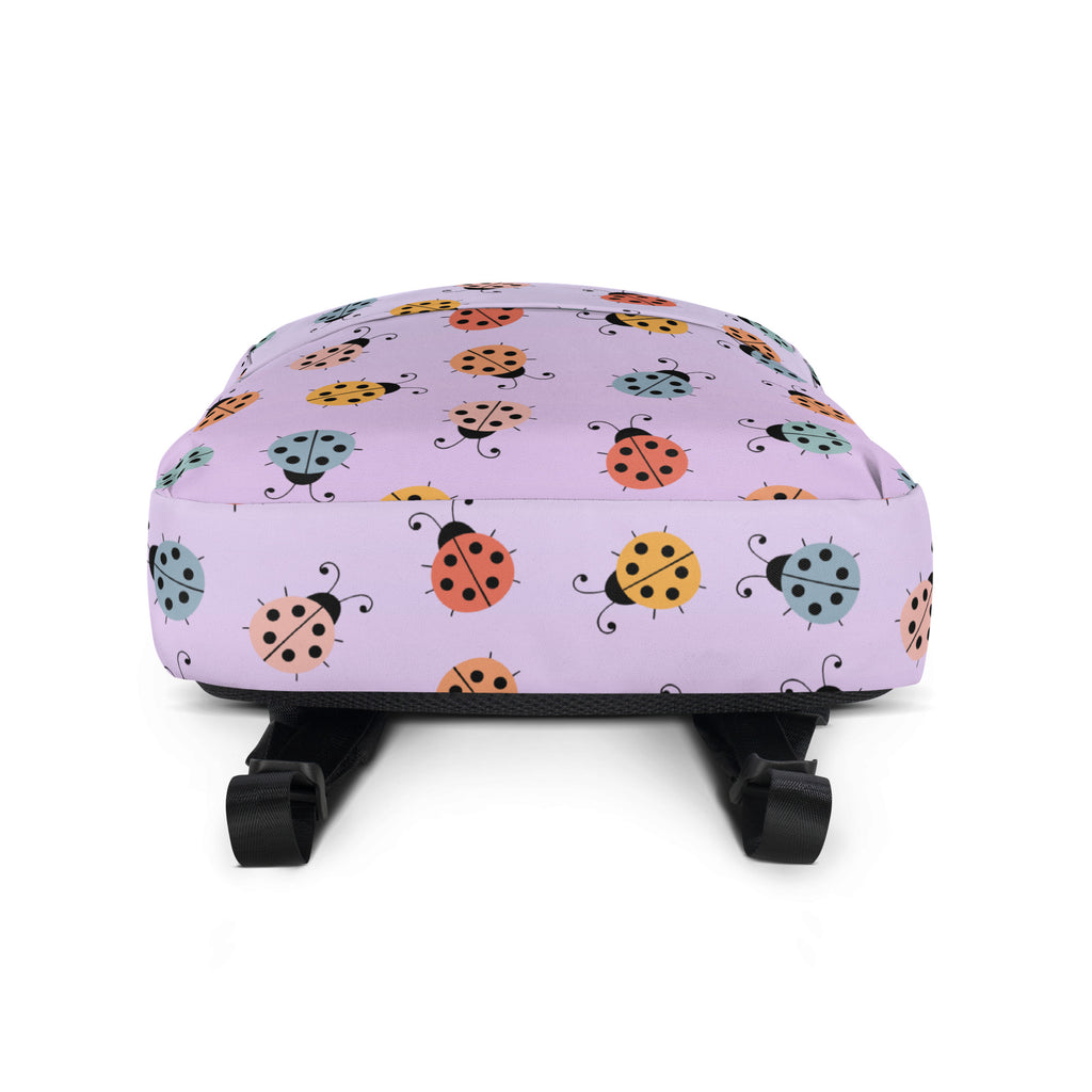 Girls colorful ladybug backpack in lavender with a playful orange yellow and teal ladybug pattern for kids