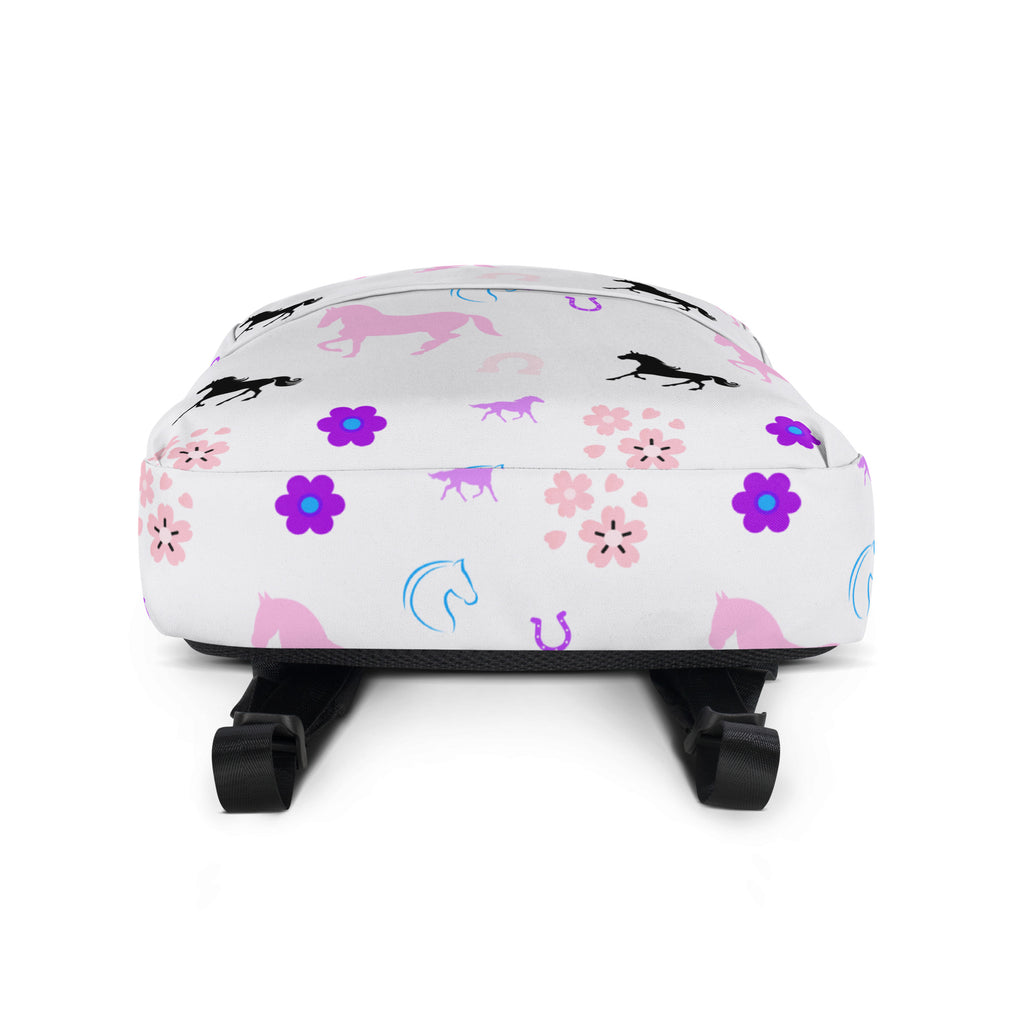White girls horse print backpack featuring pink purple and black horses flowers and horseshoes pattern