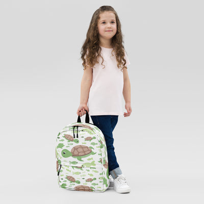 White kids sea turtles backpack featuring green and brown turtle pattern and durable fabric for everyday use