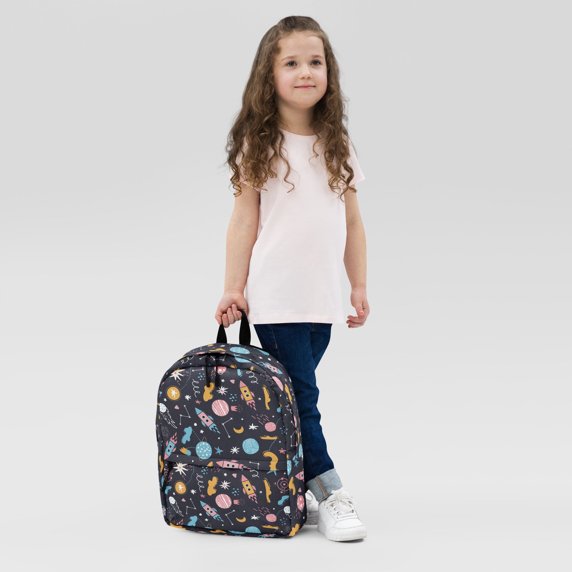 Kids outer space backpack black with playful pastel rockets planets and stars pattern ideal for school use
