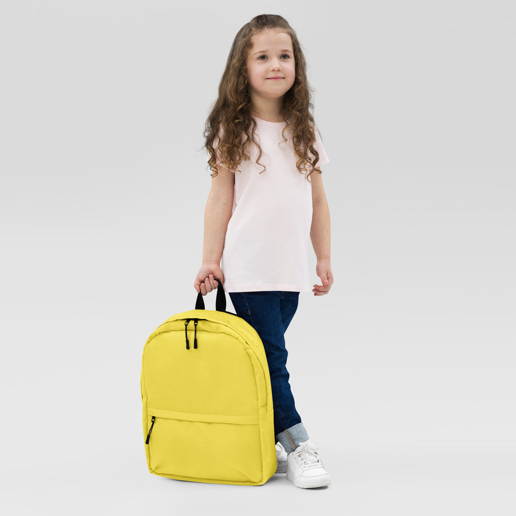 Kids yellow backpack with bright yellow fabric and black zippers and handles for school or travel use