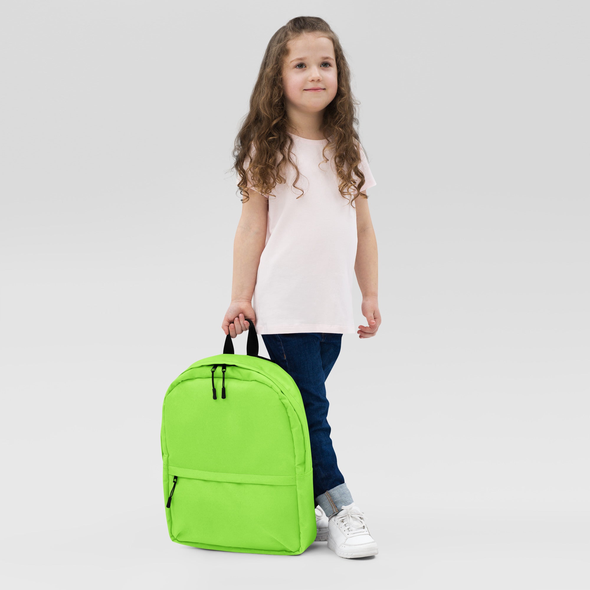 Kids lime green backpack with bright lime green material black zippers and handles for everyday use