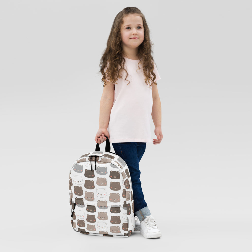Kids kawaii bear print backpack in white with a repeating pattern of brown and gray cartoon bear faces