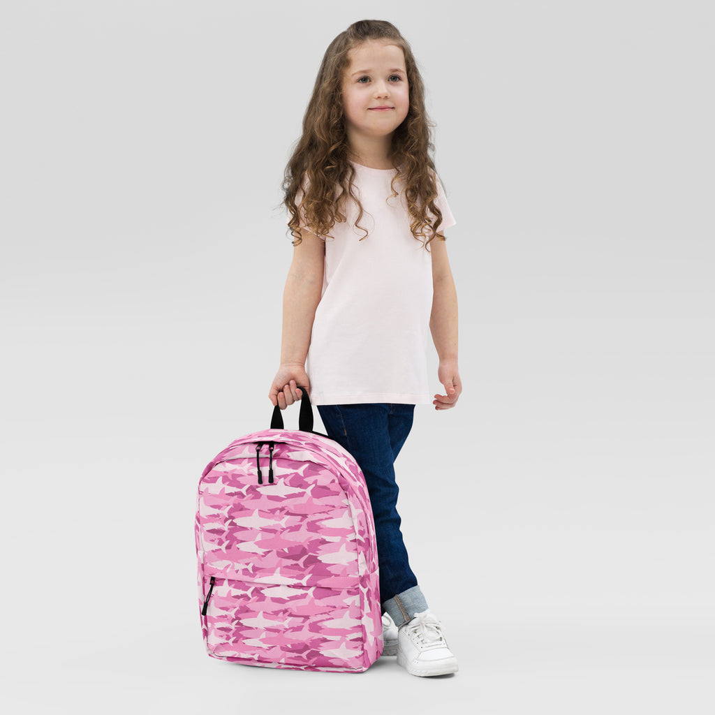 Girls pink sharks backpack with pink camouflage pattern black zippers and handles for school or casual use