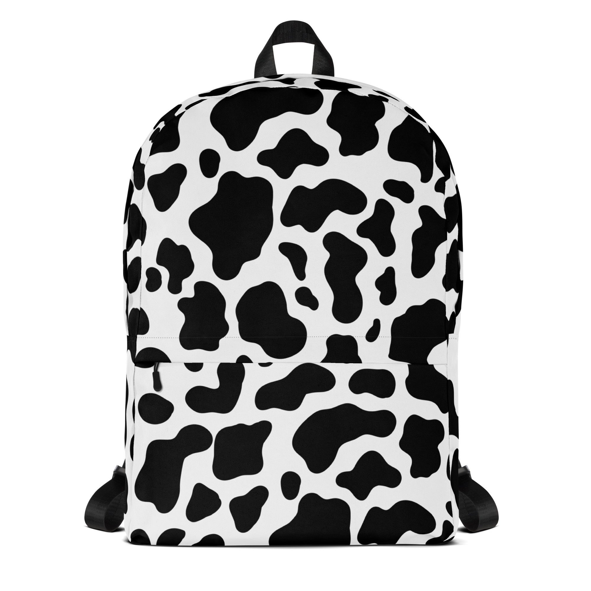 Kids cow print backpack in black and white with front zippered pocket for school and daily use