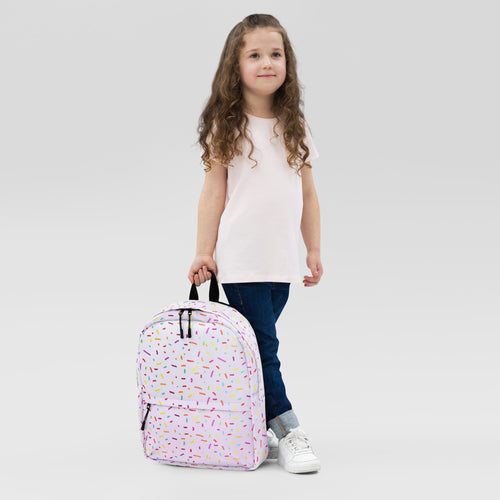 Pastel pink girls colorful ice cream sprinkles backpack with multicolored playful sprinkle pattern