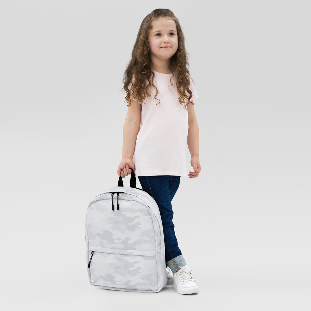 Kids white camouflage backpack in silver and gray pattern with black zippers shown from the back side