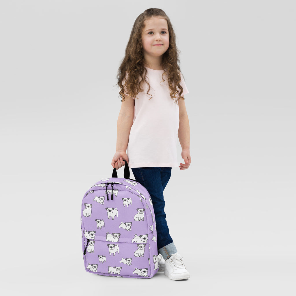 Girls purple pug backpack with repeating white and black cartoon pug pattern on durable fabric for everyday use