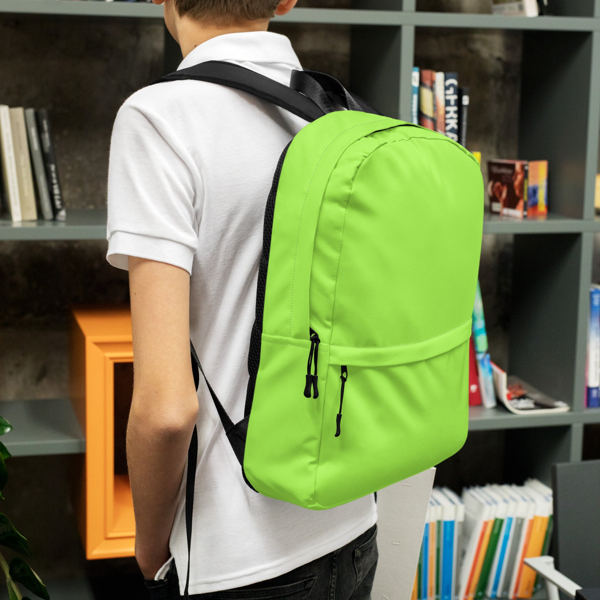 Kids lime green backpack with black straps and zippers designed for durability and everyday use