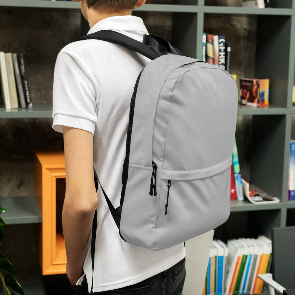 Kids gray backpack with black straps and zippers made of durable material for everyday use