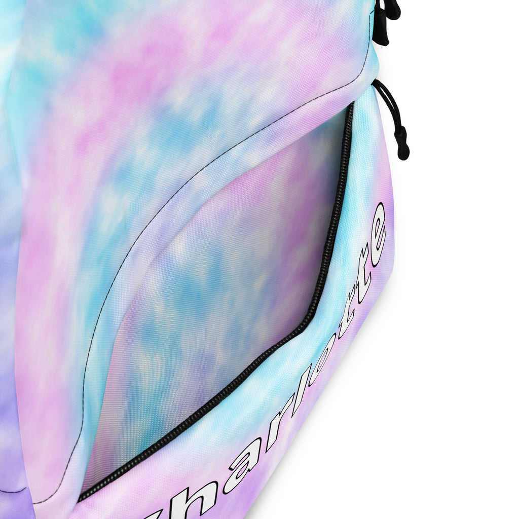 Girls custom name faux tie dye backpack in pastel with mesh side pocket black zipper and white cursive name charlotte