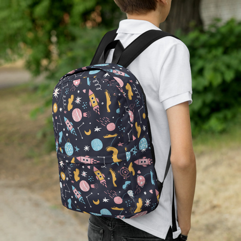 Kids outer space backpack in black with colorful pastel rockets planets and stars for playful everyday use