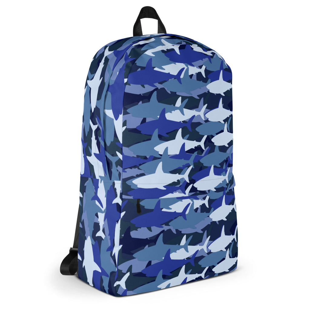 Kids blue sharks backpack featuring blue and white shark camouflage design with black straps for school use