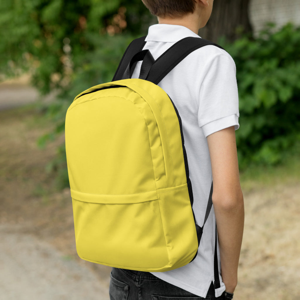Kids yellow backpack with bright yellow color black straps and minimalist design for everyday use