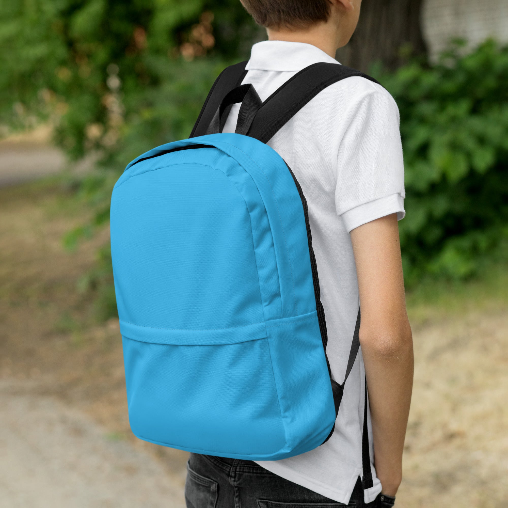 Kids sky blue backpack made of bright blue canvas with black straps for comfortable carry and durability