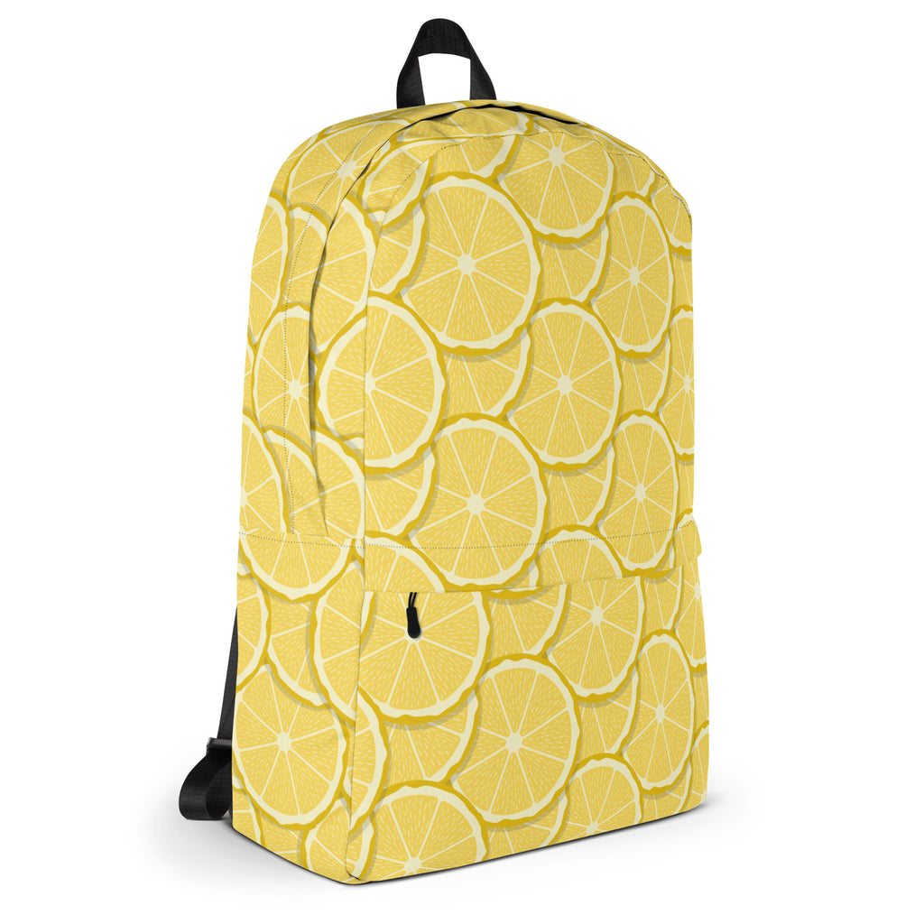 A vibrant yellow kids lemon slice backpack featuring a repeating pattern of sliced lemons for daily use