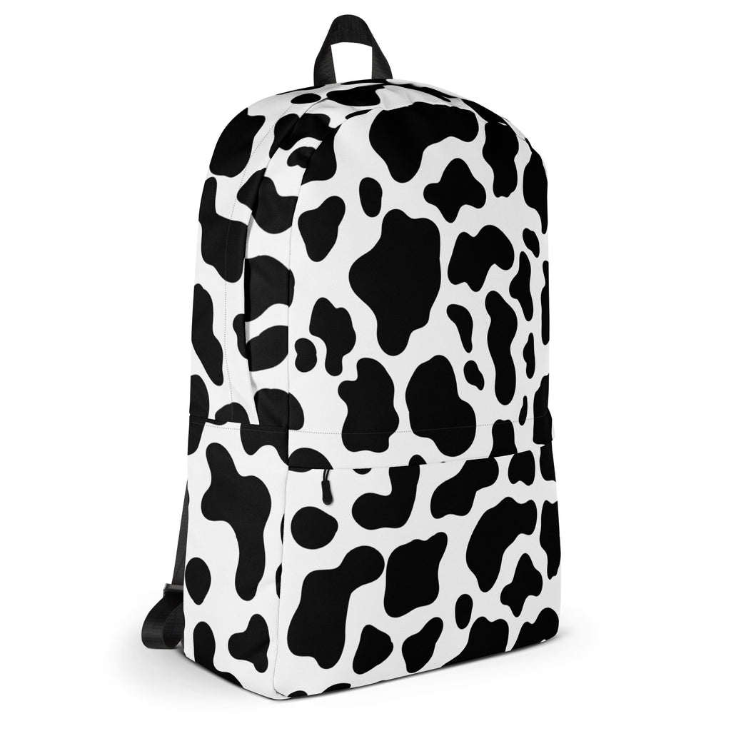 Kids cow print backpack in black and white with durable fabric finish for everyday use
