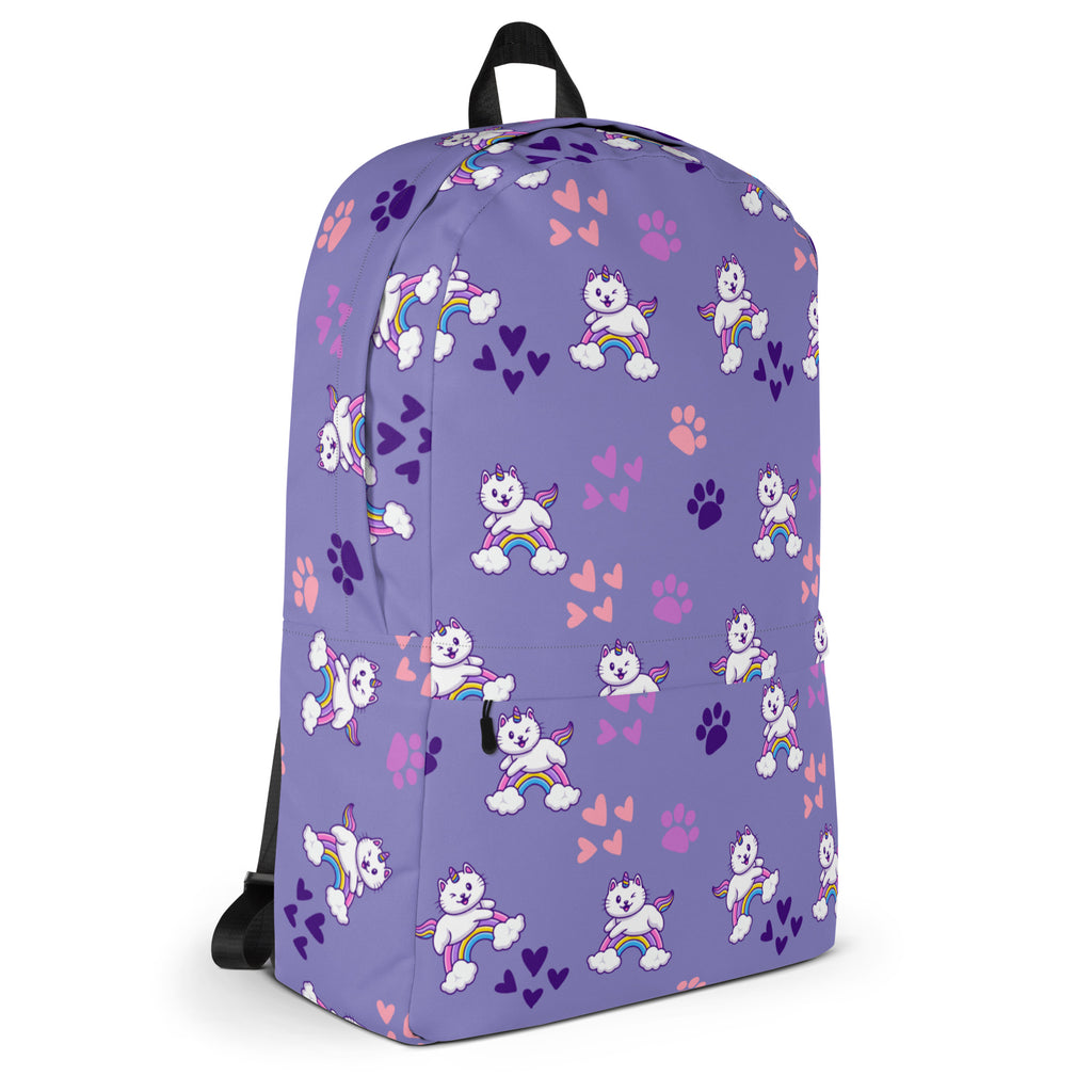 Girls purple rainbow caticorn backpack with playful white winged cat, rainbow, and pink purple paw print pattern