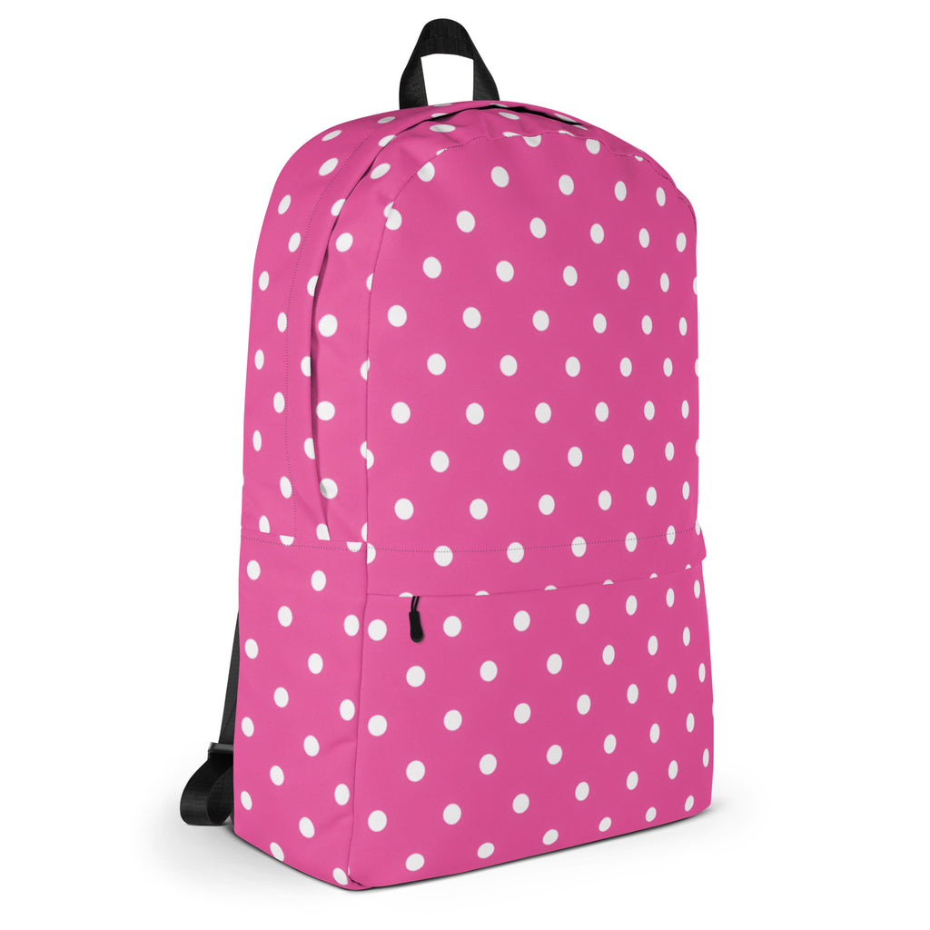 Girls pink polka dots backpack with vibrant pink fabric, white polka dot pattern, black straps, and top handle