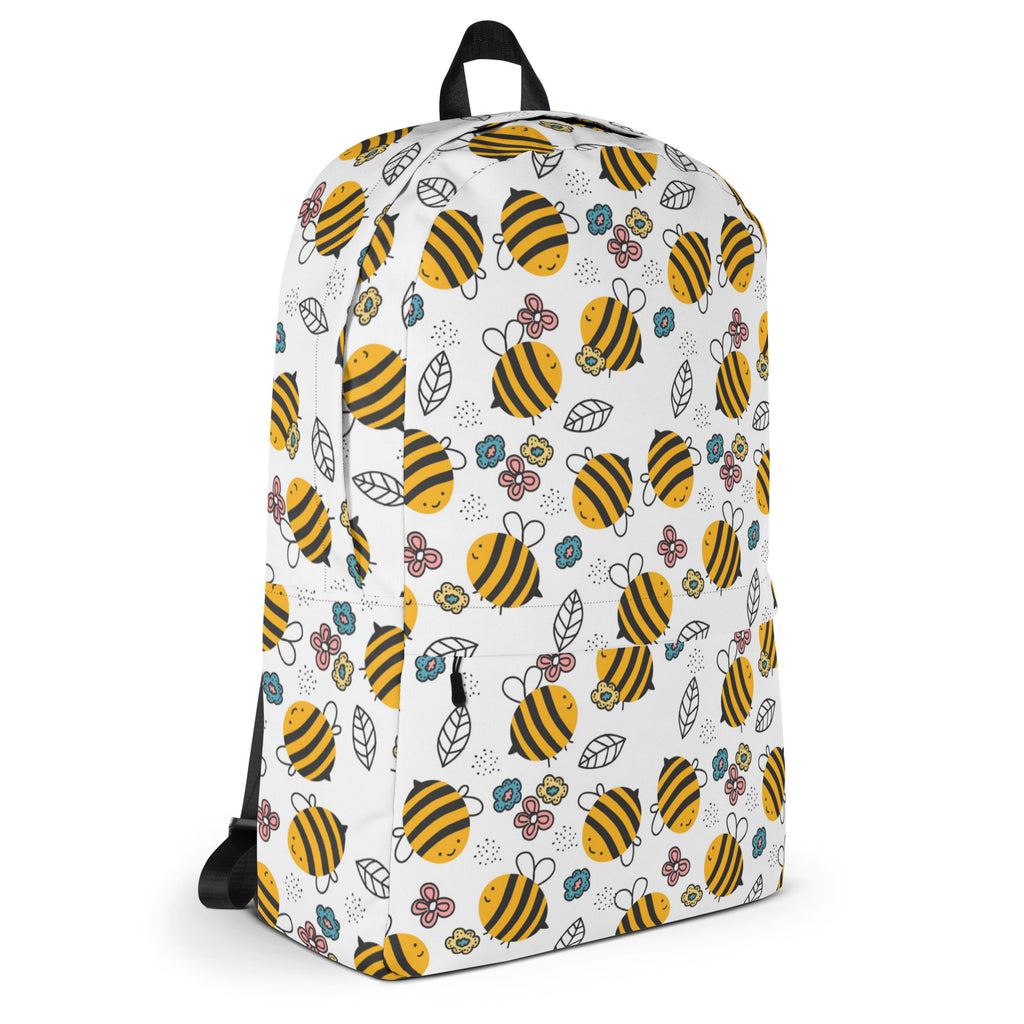 White kids floral bees backpack with playful yellow and black cartoon bee, flower, and leaf pattern