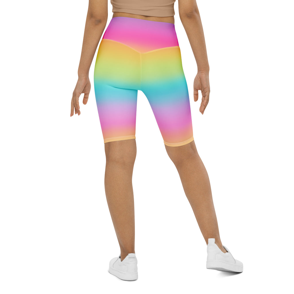 Women’s bright rainbow high waisted biker shorts made of stretchy moisture wicking fabric for active fit